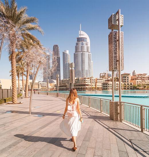 lady waling around lower city of Dubai